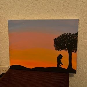 Guy and girl under tree